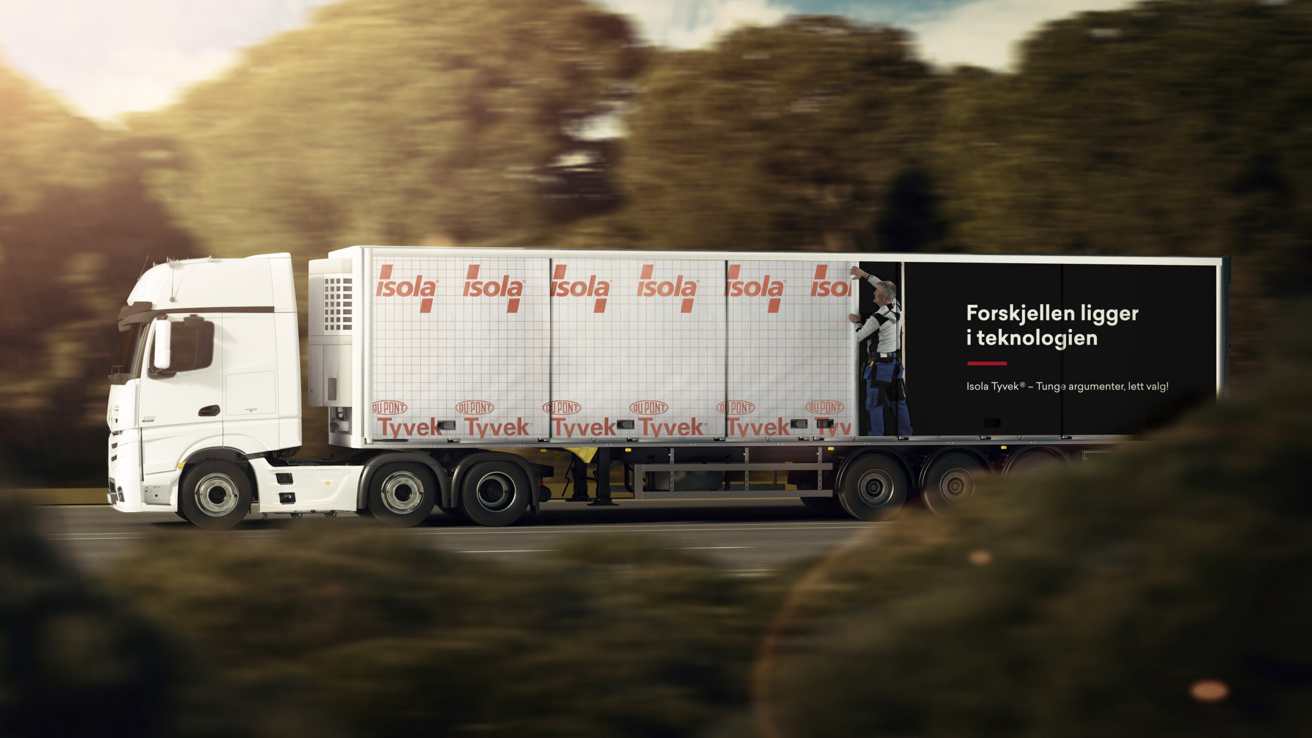 Refrigerated Truck with trailer driving on street.